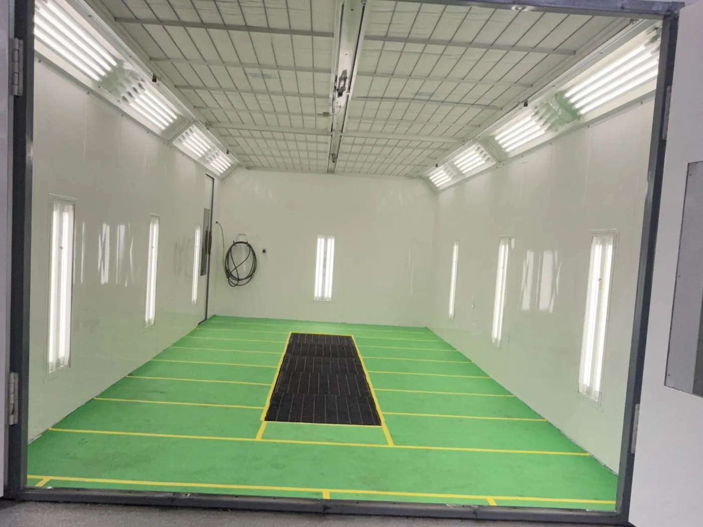 C-Auto's climate-controlled downdraft paint booth